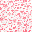 Pennick wallpaper in coral on ivory by Schumacher, featuring a painterly floral silhouette design.