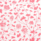 Pennick wallpaper in coral on ivory by Schumacher, featuring a painterly floral silhouette design.