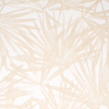 Sunlit Palm Sand wallpaper by Schumacher, featuring a dreamy, dappled palm leaf watercolor design in soft beige tones.
