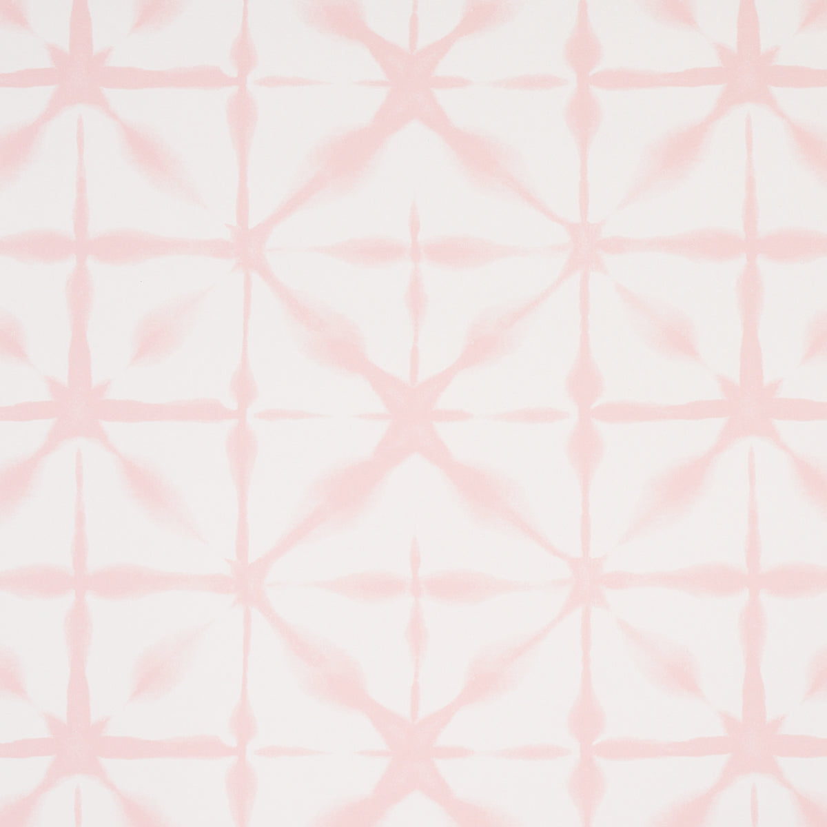 Andromeda Pink uncoated nonwoven wallpaper with a soft, shibori-inspired geometric pattern by Schumacher