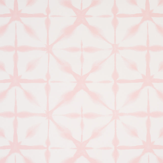 Andromeda Pink uncoated nonwoven wallpaper with a soft, shibori-inspired geometric pattern by Schumacher