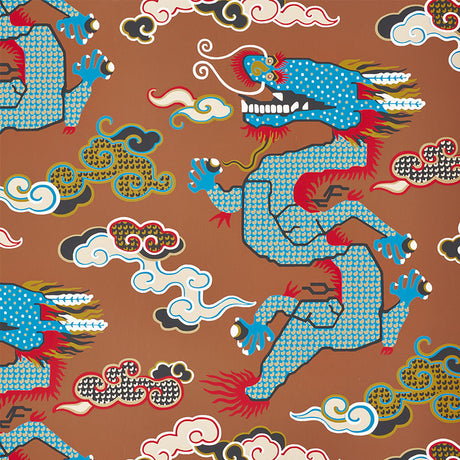 Magical Ming Dragon wallpaper by Schumacher featuring stylized blue dragons and clouds on a brown background, designed by Johnson Hartig.