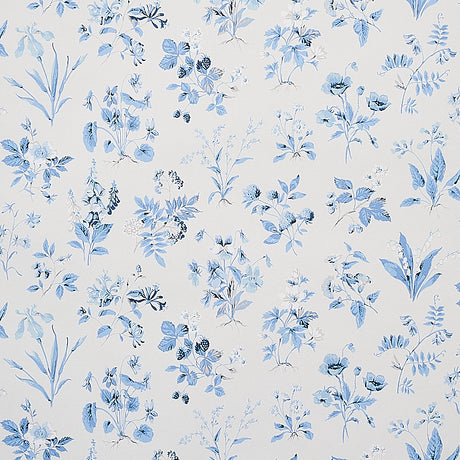 Floreana blue English wildflowers wallpaper by Schumacher, featuring a delicate floral pattern in blue on a light background.