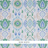 ELIZIA IKAT wallpaper in green and blue, wide-width uncoated nonwoven wallcovering with an ikat-inspired pattern by Schumacher.