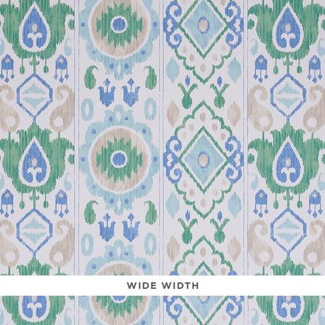 ELIZIA IKAT wallpaper in green and blue, wide-width uncoated nonwoven wallcovering with an ikat-inspired pattern by Schumacher.
