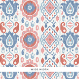 ELIZIA IKAT wallpaper in Rose & Indigo by Schumacher, a wide-width wallcovering with a delicate ikat pattern in muted pink and blue tones.