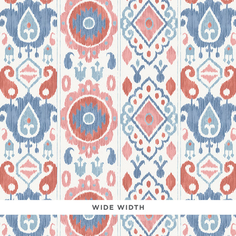 ELIZIA IKAT wallpaper in Rose & Indigo by Schumacher, a wide-width wallcovering with a delicate ikat pattern in muted pink and blue tones.