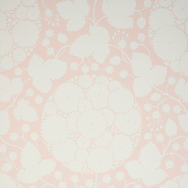 Marianne Blush by Schumacher - Large scale pop-art floral wallpaper in soft blush pink and white, styled in bedroom and nursery settings.