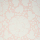 Marianne Blush by Schumacher - Large scale pop-art floral wallpaper in soft blush pink and white, styled in bedroom and nursery settings.