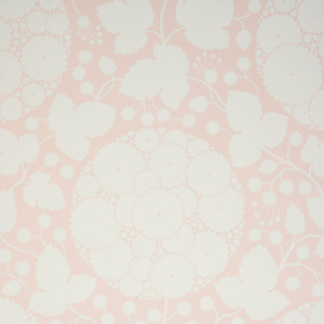 Marianne Blush by Schumacher - Large scale pop-art floral wallpaper in soft blush pink and white, styled in bedroom and nursery settings.