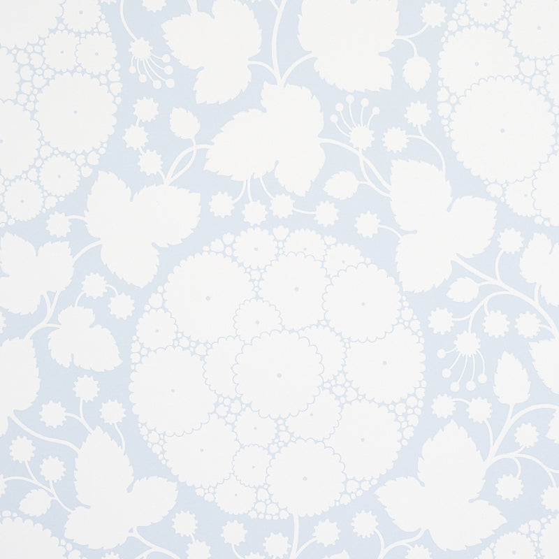 Marianne Sky large-scale floral wallpaper with silhouetted dandelion pattern by Schumacher, shown in a bathroom interior.