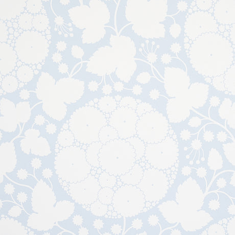 Marianne Sky large-scale floral wallpaper with silhouetted dandelion pattern by Schumacher, shown in a bathroom interior.