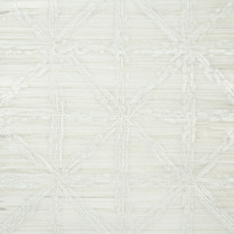 Aventurine Performance Silver geometric textured high performance wallcovering by Schumacher shown in a living room setting.