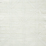 Aventurine Performance Silver geometric textured high performance wallcovering by Schumacher shown in a living room setting.