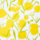 JOAN wallpaper in yellow by Schumacher, featuring large-scale stylized floral blooms with a retro vibe on a high-gloss ground.