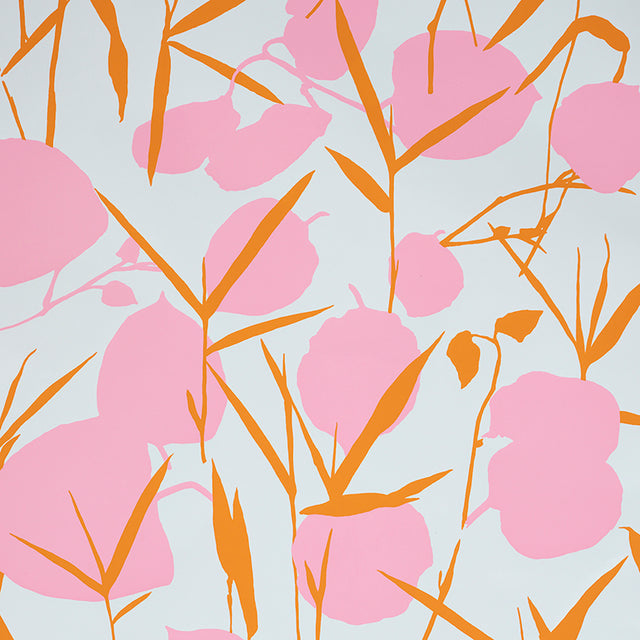 JOAN Pink large-scale floral wallpaper by Schumacher, featuring stylized blooms in a retro-inspired design.