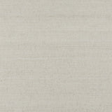Haruki Sisal Dove wallcovering by Schumacher, shown in a neutral textured finish and styled in a modern interior setting.