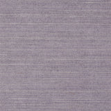 Haruki Sisal Thistle wallpaper by Schumacher shown in a modern home office and close-up detail.