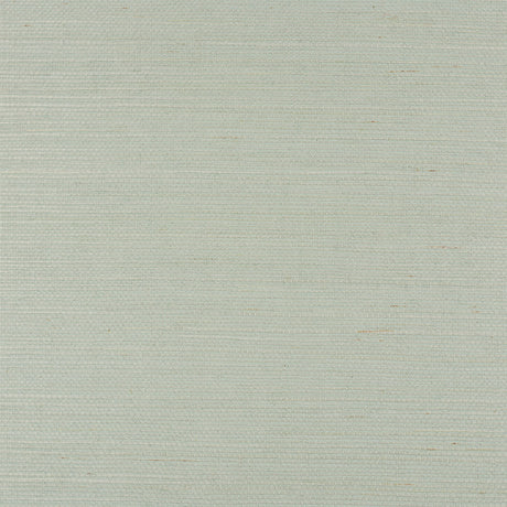 Haruki Sisal Aloe grasscloth wallpaper by Schumacher shown in close-up and styled in a modern interior setting.
