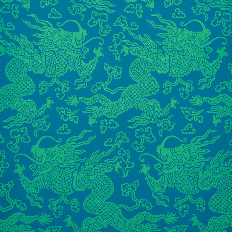 Ruan Dragon Damask wallpaper in Peacock by Schumacher, featuring a vibrant Art Deco chinoiserie dragon pattern in blue and green tones.