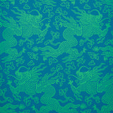 Ruan Dragon Damask wallpaper in Peacock by Schumacher, featuring a vibrant Art Deco chinoiserie dragon pattern in blue and green tones.