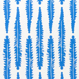 Blue fern leaf pattern wallpaper by Molly Mahon for Schumacher, inspired by English countryside foliage, hand block print style.