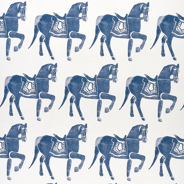 Marwari Horse wallpaper in navy by Molly Mahon for Schumacher, featuring whimsical block-printed horses inspired by Rajasthani design.