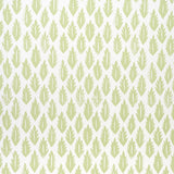 Leaf pattern wallpaper in grass green by Molly Mahon for Schumacher, shown in a styled interior and close-up views.