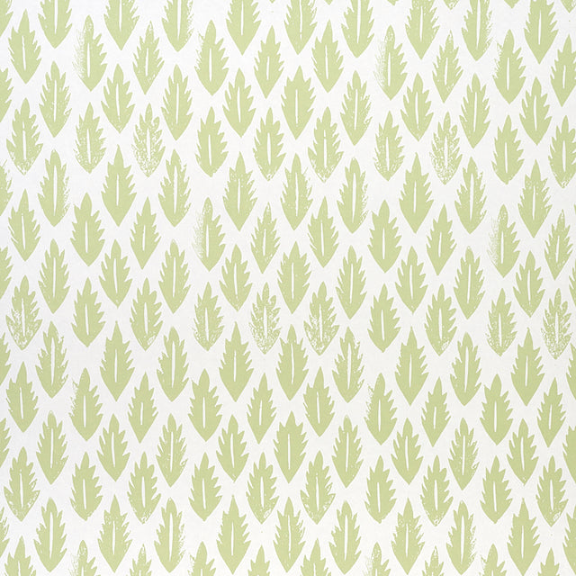 Leaf pattern wallpaper in grass green by Molly Mahon for Schumacher, shown in a styled interior and close-up views.