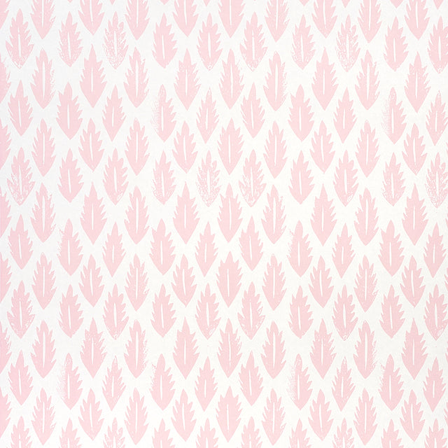 Pink leaf pattern wallpaper by Molly Mahon for Schumacher, hand block print style, shown in a bedroom setting.
