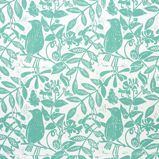 Bird & Bee Seaglass wallpaper by Molly Mahon for Schumacher. Hand block print style with birds, bees, and botanical motifs in green on white.