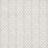 Sunda Hand Blocked Print wallpaper in grey, featuring a soft geometric pattern of stripes and medallions, handprinted for depth and dimension.