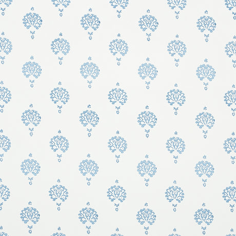Dahlia Hand Blocked Print wallpaper in blue, featuring a simple floral motif hand printed with traditional block printing techniques.