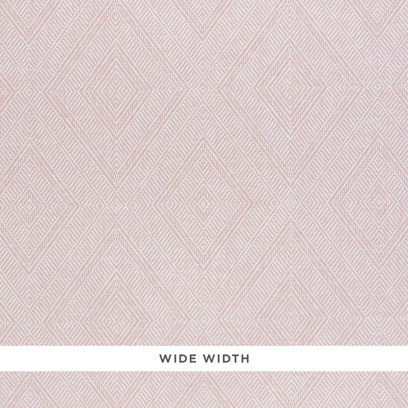 Tortola Paperweave pink diamond geometric woven wallpaper by Schumacher shown in a bathroom setting and close-up detail.