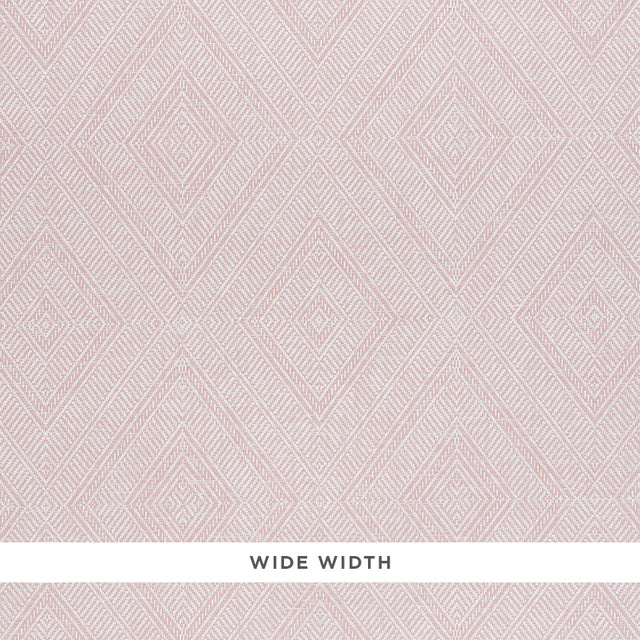 Tortola Paperweave pink diamond geometric woven wallpaper by Schumacher shown in a bathroom setting and close-up detail.