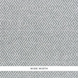 JUBILEE PAPERWEAVE grey woven geometric wallpaper by Schumacher, shown in close-up and room setting.