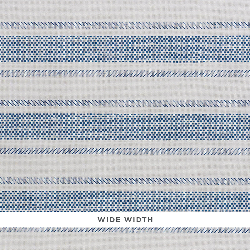 Oxnard Paperweave blue and white woven stripe wallpaper by Schumacher, shown in close-up and room setting
