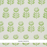 Rosenborg green stylized tulip Scandinavian modern wallpaper by Schumacher, wide width, hand block print look
