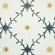 Palladio Trellis wallpaper by Schumacher featuring a stylized trellis and sun motif in black and gold on a light background.