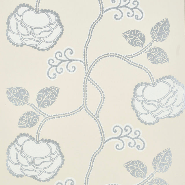 Queen Fruit wallpaper in Silver White by Neisha Crosland for Schumacher, featuring stylized blossoms and curlicued leaves in a botanical pattern.