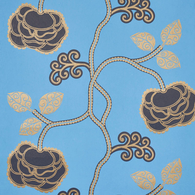 Queen Fruit wallpaper in Lapis by Neisha Crosland for Schumacher, featuring stylized blossoms and curlicued leaves in blue and gold.