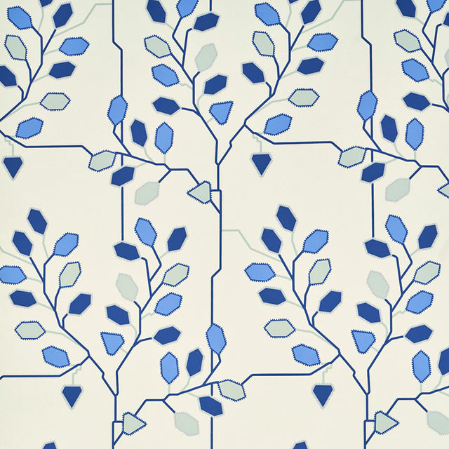 TUMBLE WEED wallpaper in Delft Blue by Neisha Crosland for Schumacher, featuring a geometric arboreal motif in blue and white.