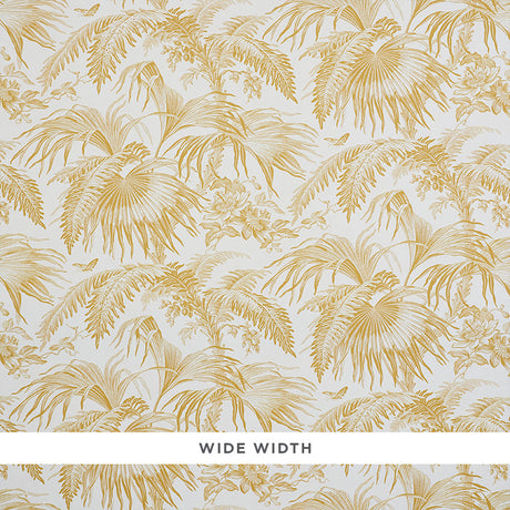 TOILE TROPIQUE wallpaper in gold, featuring detailed botanical illustrations of tropical palms and flowers in a wide width design by Schumacher.