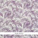 TOILE TROPIQUE wallpaper in purple by Schumacher, featuring detailed botanical illustrations of tropical palms and flowers.