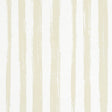 Sketched Stripe wallpaper in Natural by Schumacher features hand-painted vertical lines in a painterly stripe motif.