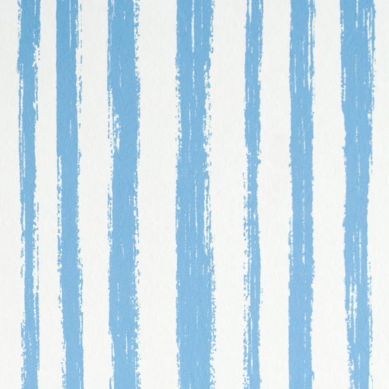Blue hand-painted vertical stripe wallpaper with painterly effect from Schumacher's Stripe Wallcovering Collection.