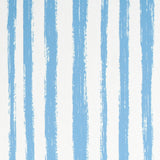 Blue hand-painted vertical stripe wallpaper with painterly effect from Schumacher's Stripe Wallcovering Collection.