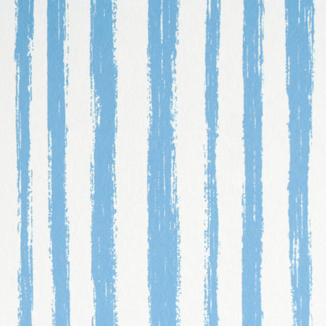 Blue hand-painted vertical stripe wallpaper with painterly effect from Schumacher's Stripe Wallcovering Collection.