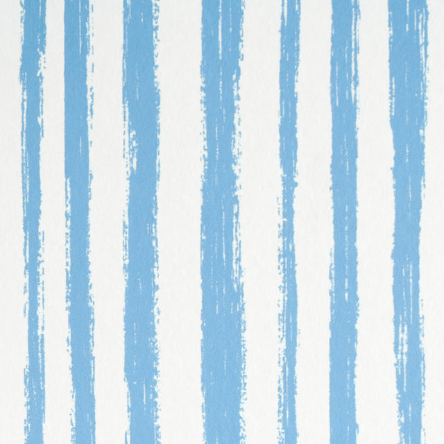 Blue hand-painted vertical stripe wallpaper with painterly effect from Schumacher's Stripe Wallcovering Collection.