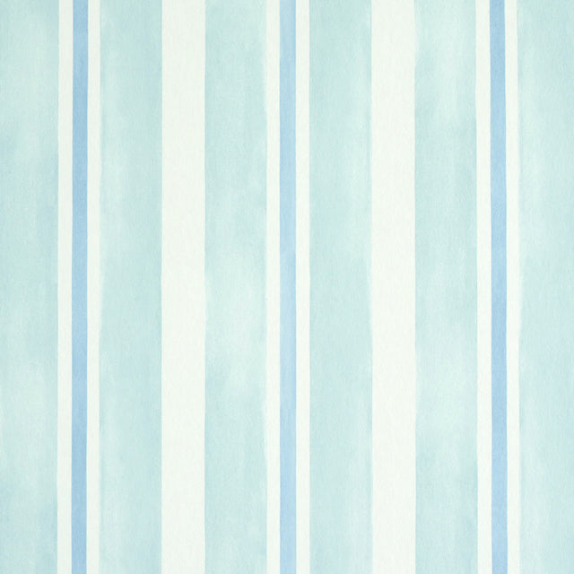 Watercolor Stripe Mineral wallpaper by Schumacher features hand-painted, blue and white vertical stripes in a soft, watercolor effect.